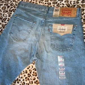 Levi’s 501 original (men’s). New with tags. Waist 34 x Length 32.